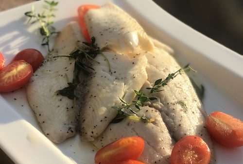 Tilapia Fish with Cherry Tomatoes and Italian Herbs